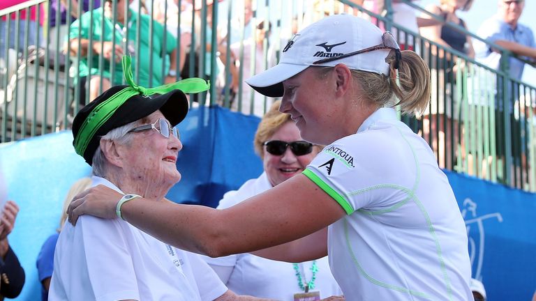 Stacy Lewis (r) greets LPGA Founder Louise Suggs after winning the the RR Donnelley LPGA Founders Cup at Wildfire Golf Club in 2013