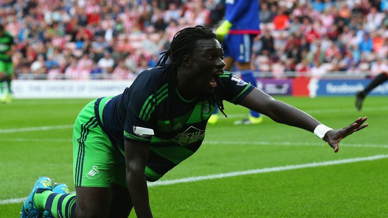 Bafetimbi Gomis celebrates scoring Swansea's opening goal
