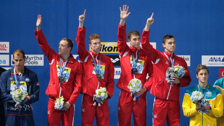Gold medalists Daniel Wallace, Robert Renwick, Calum Jarvis and James Guy of Great Britain pose during the medal ceremony