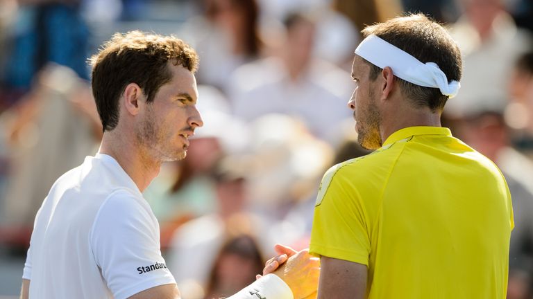 Andy Murray shakes hands with Gilles Muller during day four of the Montreal Masters
