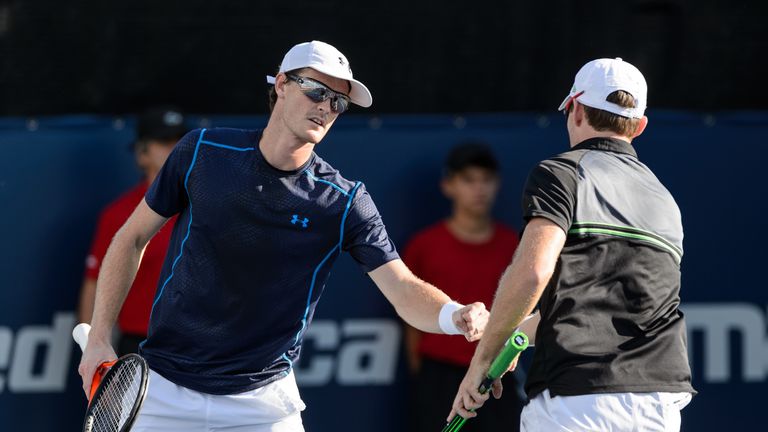 Jamie Murray  encourages teammate John Peers during their doubles match in Montreal