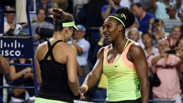 Belinda Bencic is congratulated by Serena Williams at the Rogers Cup