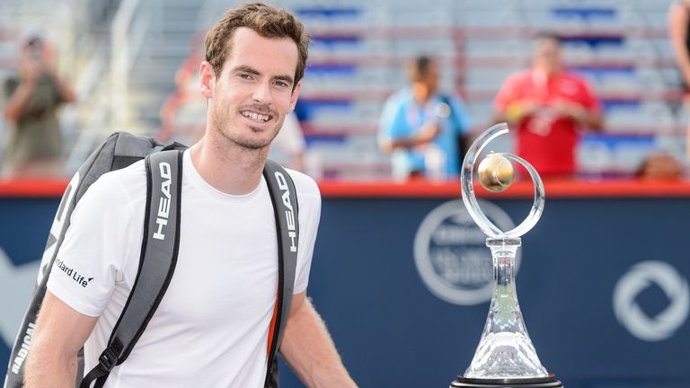 Andy Murray poses with the trophy after defeating Novak Djokovic at the Montreal Masters