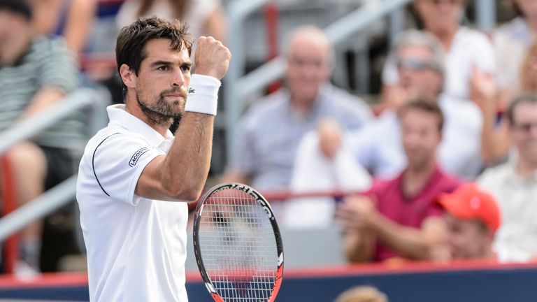 Jeremy Chardy reacts after winning the tie-break in the second set against John Isner