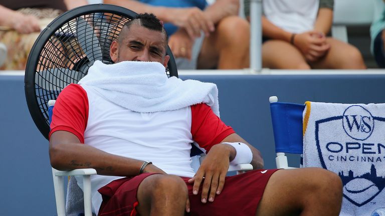 Nick Kyrgios takes a break between sets during his first round match against Richard Gasquet 