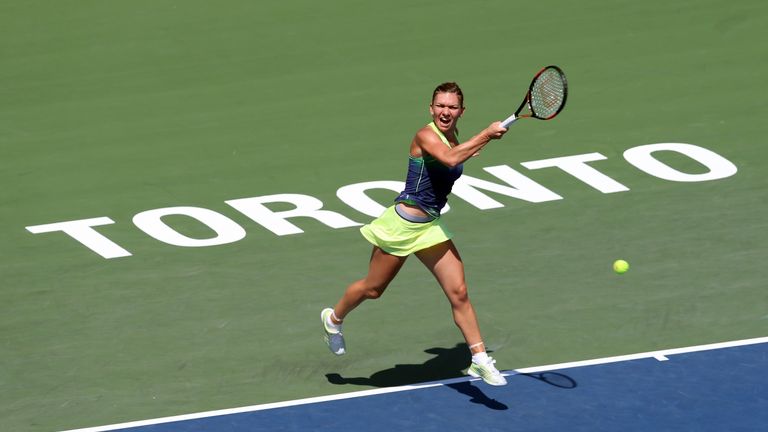 Simona Halep plays a shot against Sara Errani during the Rogers Cup in Toronto