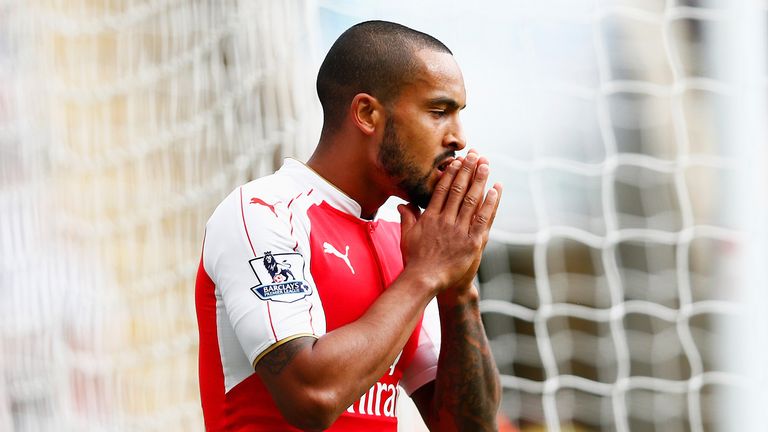 Theo Walcott of Arsenal reacts