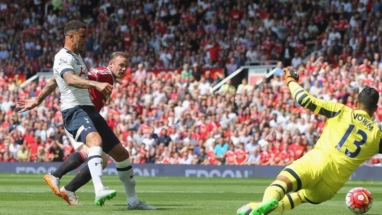 Tottenham's Kyle Walker scores an own-goal while trying to intercept Wayne Rooney bearing down on goal 
