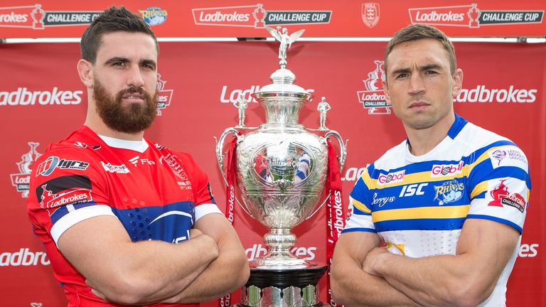 Hull K R's Tyrone McCarthy (L) and Leeds' Kevin Sinfield with the Ladbrokes Challenge Cup Trophy