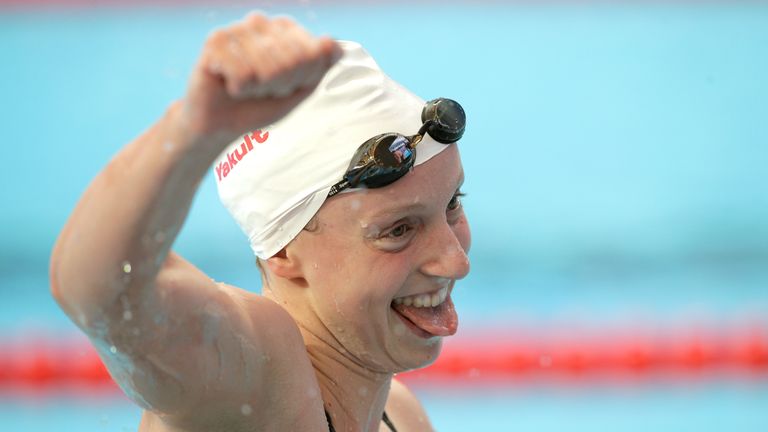 Katie Ledecky of the United States reacts after setting a new world record of 15:27.71 in the Women's 1500m Freestyle Heats on 
