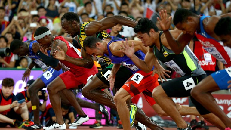 Usain Bolt (cenre left) impresses in his 100m heat 