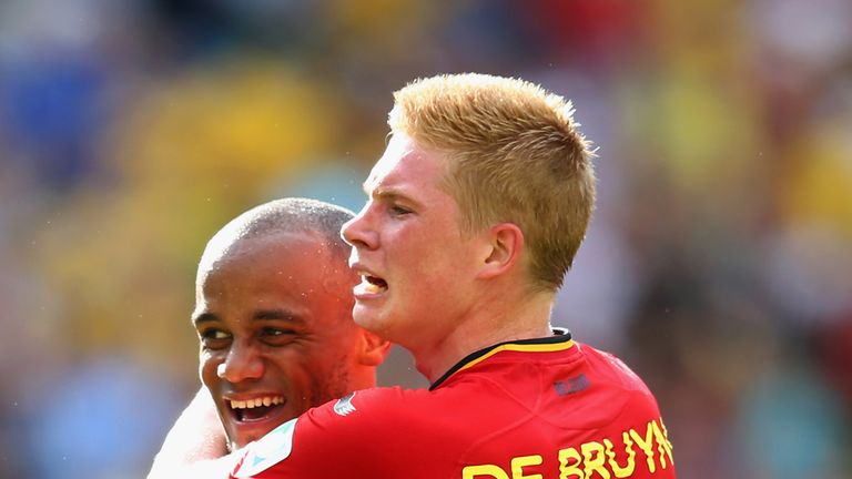 Vincent Kompany and Kevin De Bruyne of Belgium celebrate during the 2014 FIFA World Cup Brazil Group H match between Belgium and Russia