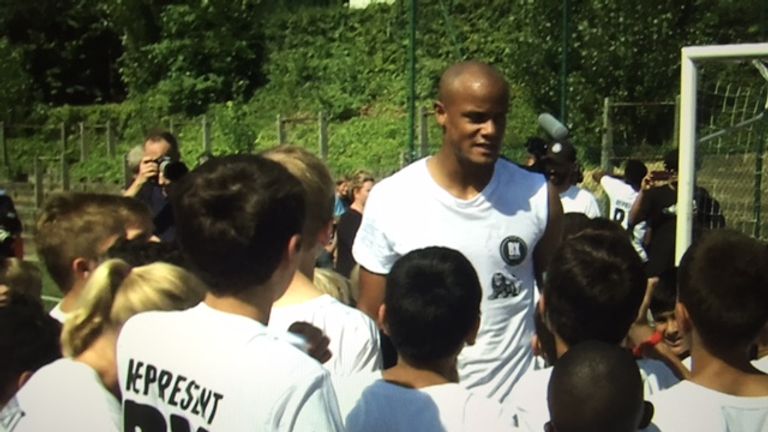 Vincent Kompany with children at BX Brussels, the football club he set up in Belgium