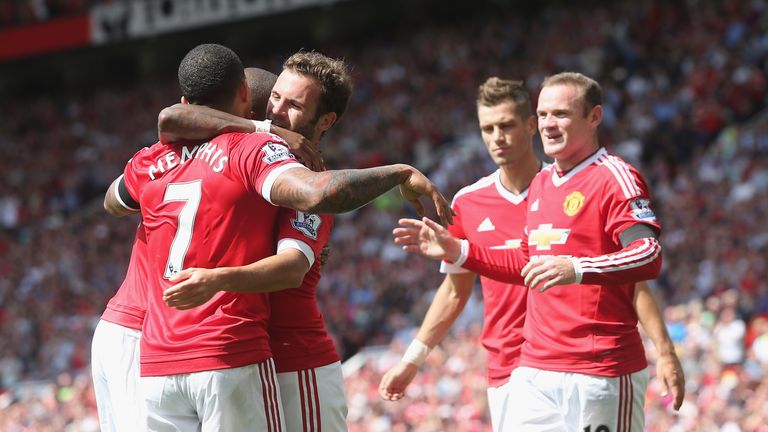 Wayne Rooney , Juan Mata and Memphis Depay of Manchester United celebrate an own goal from Tottenham's Kyle Walker