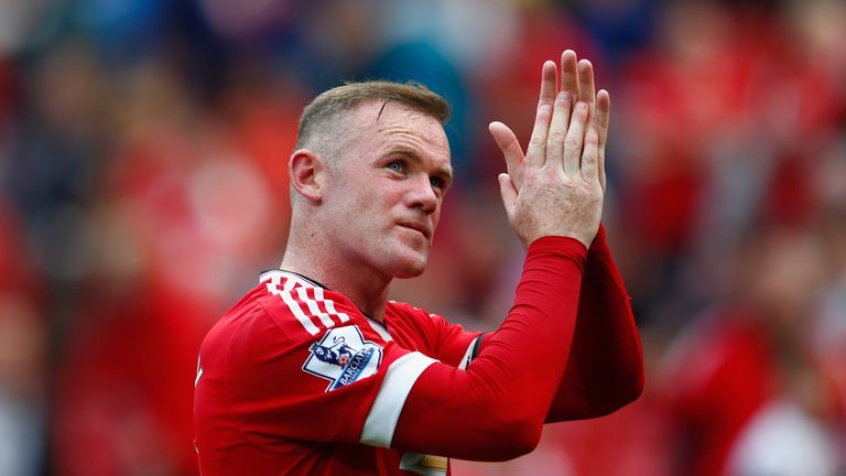 Wayne Rooney applauds the crowd