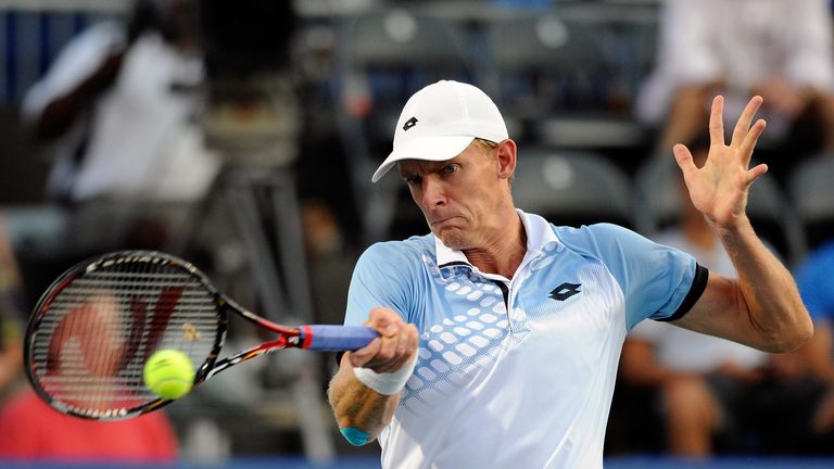 Kevin Anderson of South Africa returns a shot from Borna Coric of Croatia during the fourth day of the Winston-Salem Open a
