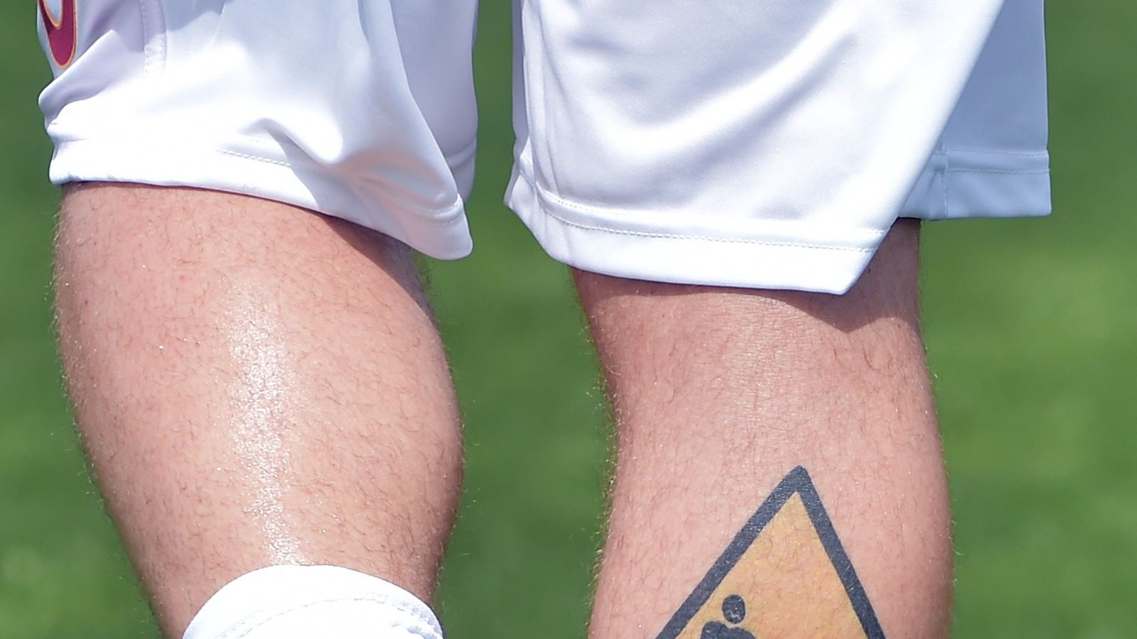 Italy defender Daniele De Rossi sports a tattoo on his leg during a  training session at the Euro 2012 soccer championship in Krakow, Poland,  Friday, June 8, 2012. (AP Photo/Gregorio Borgia Stock