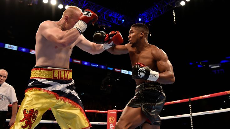 Anthony Joshua (r) boxes Gary Cornish for WBC International Heavyweight title & vacant Commonwealth Heavyweight title duri