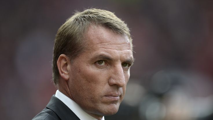 Liverpool's Northern Irish manager Brendan Rodgers arrives for the English Premier League football match against Manchester United