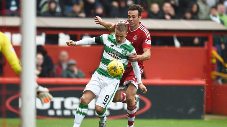 Celtic's Leigh Griffiths (left) is brought down by Aberdeen's Andrew Considine 