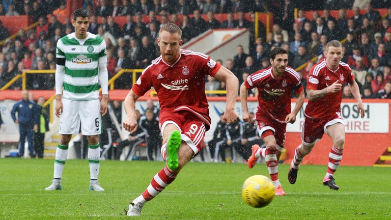 Adam Rooney equalises from the penalty spot for Aberdeen against Celtic
