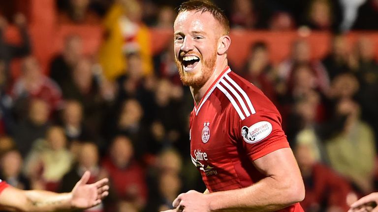 Aberdeen's Adam Rooney celebrates having fired home from the penalty spot