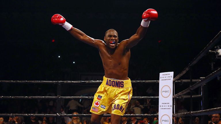 Adonis Stevenson celebrates after defeating Tommy Karpency