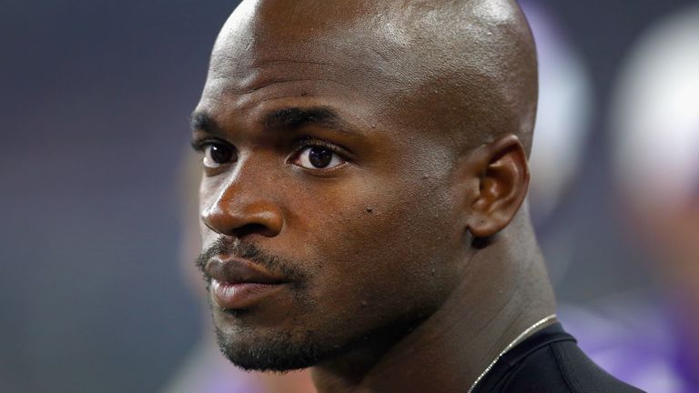 Adrian Peterson of the Minnesota Vikings looks on from the sidelines in a pre-season game against the Dallas Cowboys on August 29, 2015 in Texas
