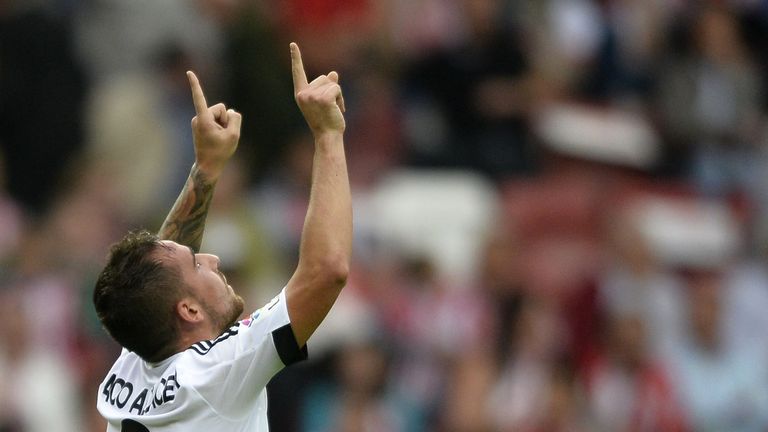 Paco Alcacer struck late to earn Valencia a 1-0 win at Sporting Gijon