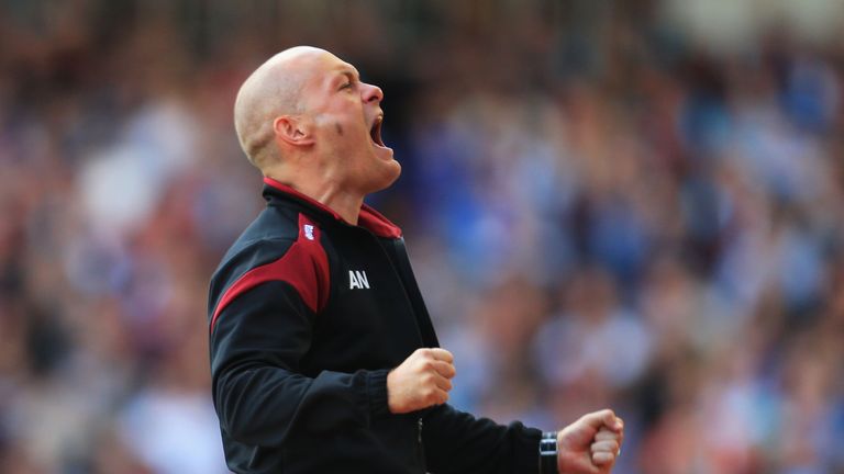 Alex Neil Manager of Norwich City celebrates his team's first goal against West Ham by Robbie Brady 