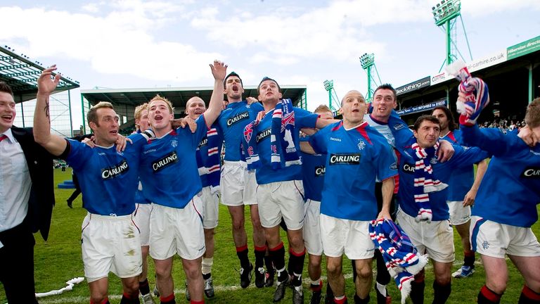 Alex Rae and Fernando Ricksen among the Rangers players celebrate after winning the SPL title in 2005