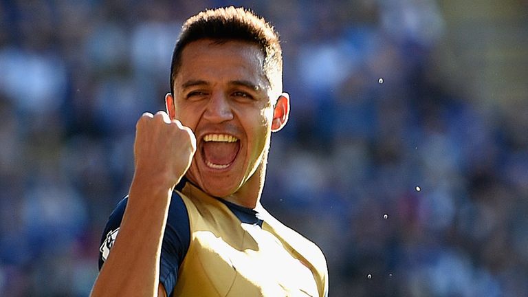 Alexis Sanchez of Arsenal celebrates completing his hat-trick v Leicester