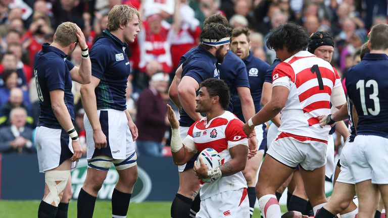 Japan No 8 Amanaki Mafi celebrates after touching down