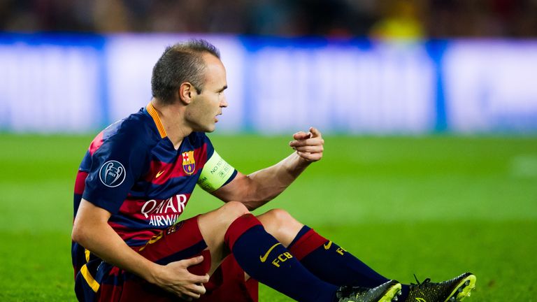 Andres Iniesta of FC Barcelona asks to his bench to be substituted as he lays injured during the UEFA Champions League Gro
