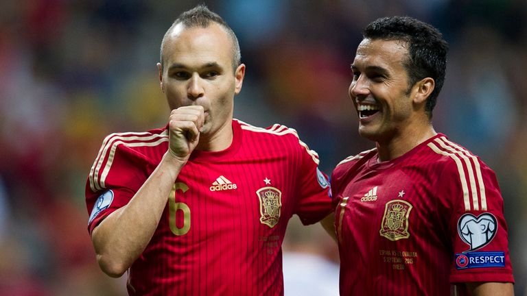 Andres Iniesta (left) celebrates after scoring against Slovakia