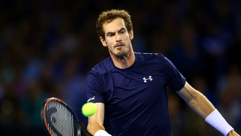 Andy Murray of Great Britain hits a return during Day One of the Davis Cup Semi Final match between Great Britain and Au