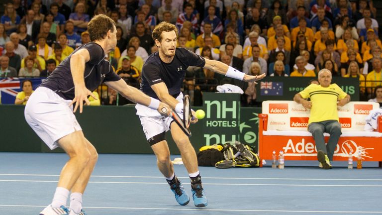 Andy Murray of Great Britain hits the net  against Lleyton Hewitt of Australia taking the match into the 5 th set 