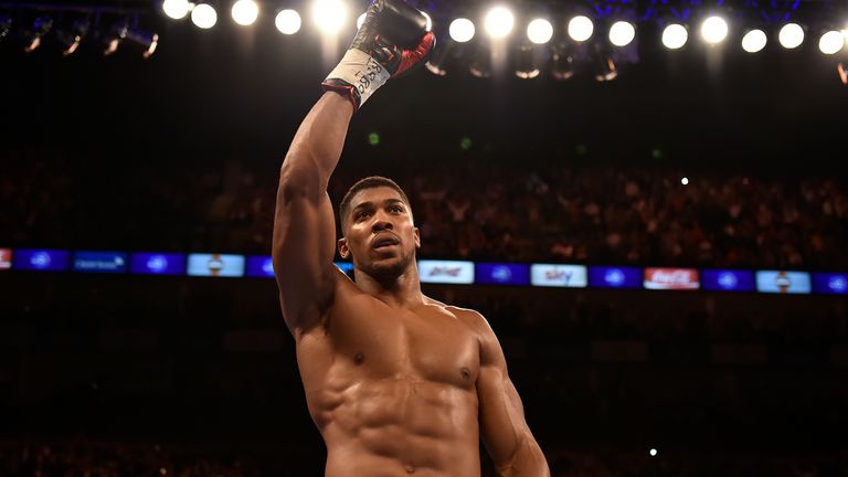 Anthony Joshua acknowledges the crowd after defeating Gary Cornish for the WBC International Heavyweight title & vacant Co