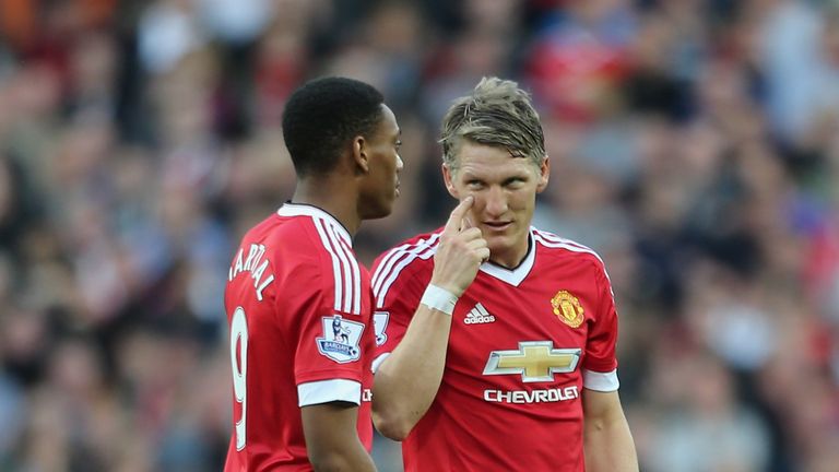Anthony Martial speaks to Bastian Schweinsteiger during the Barclays Premier League match between Manchester United and Liverpool