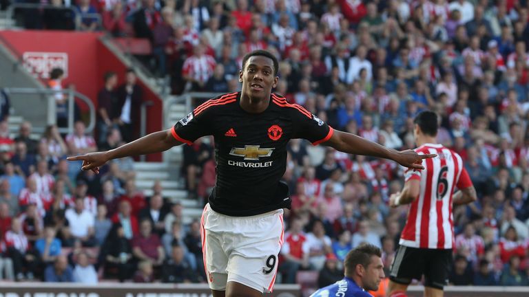 Anthony Martial celebrates scoring his second goal