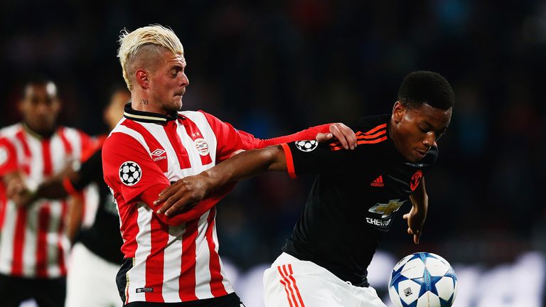 Anthony Martial of Manchester United is challenged by Maxime Lestienne of PSV Eindhoven 