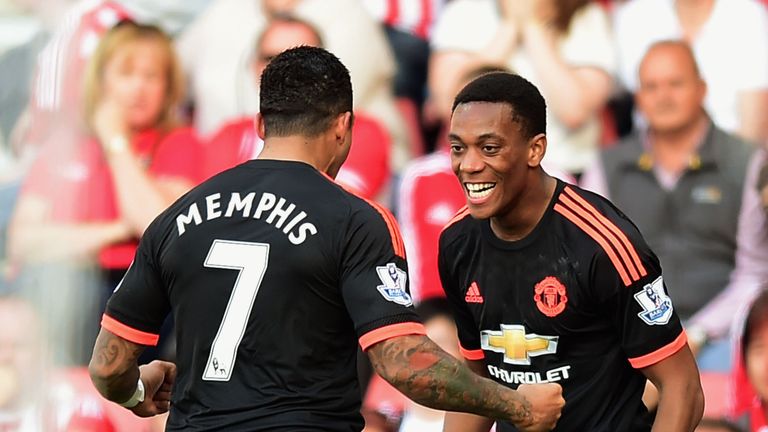 Anthony Martial celebrates with Memphis Depay