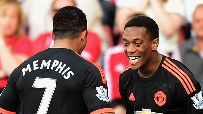 Anthony Martial celebrates with Memphis Depay