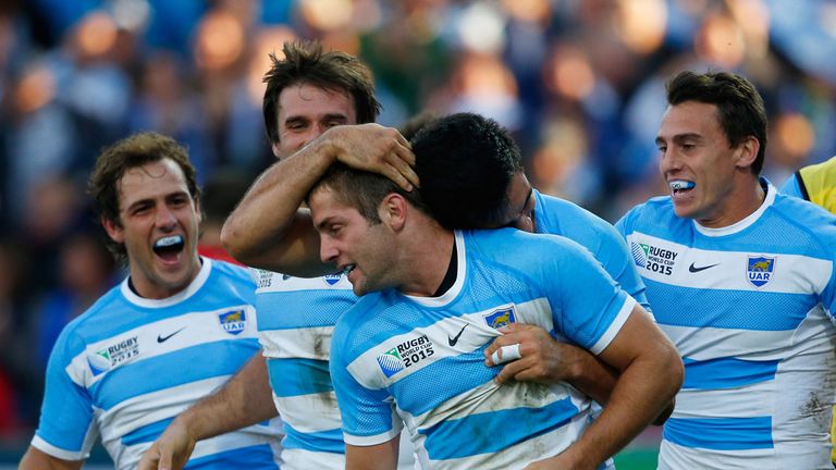 Santiago Cordero of Argentina celebrates scoring his team's fourth try with team mates during the 2015 Rugby World Cup win over Georgia