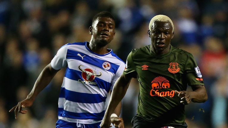 Arouna Kone of Everton breaks clear of Aaron Tshibola of Reading during the Capital One Cup third round match between Read