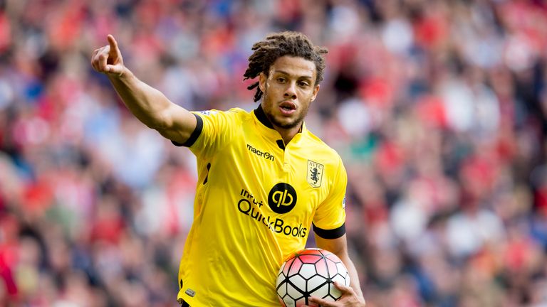 Rudy Gestede celebrates his second goal for Aston Villa against  Liverpool at Anfield