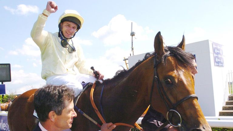 Bachelor Duke, ridden by Seb Saunders, after winning the Boylesports Irish 2,000 Guineas, Saturday, May 22, 2004, at the Curragh Racecourse, Co Kildare, Ir