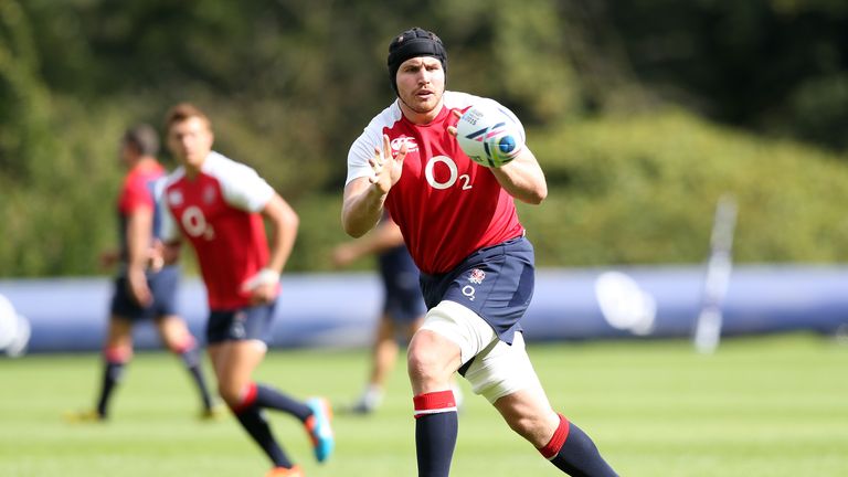 Ben Morgan catches the ball during an England training session at Pennyhill Park