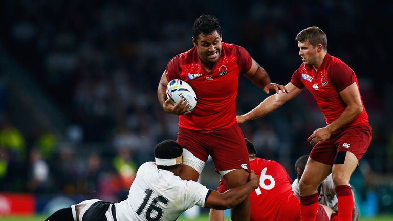 Billy Vunipola of England looks to go past Tuapati Talemaitoga of Fiji during the 2015 Rugby World Cup Pool A match between England and Fiji