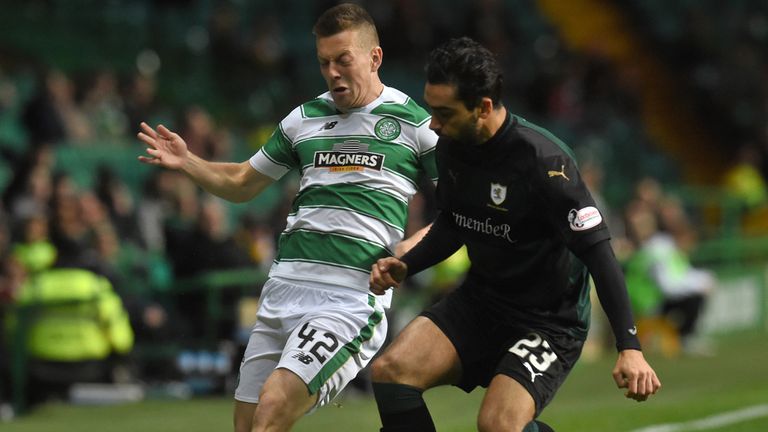 Celtic Callum McGregor holds off Rory McKeown 
